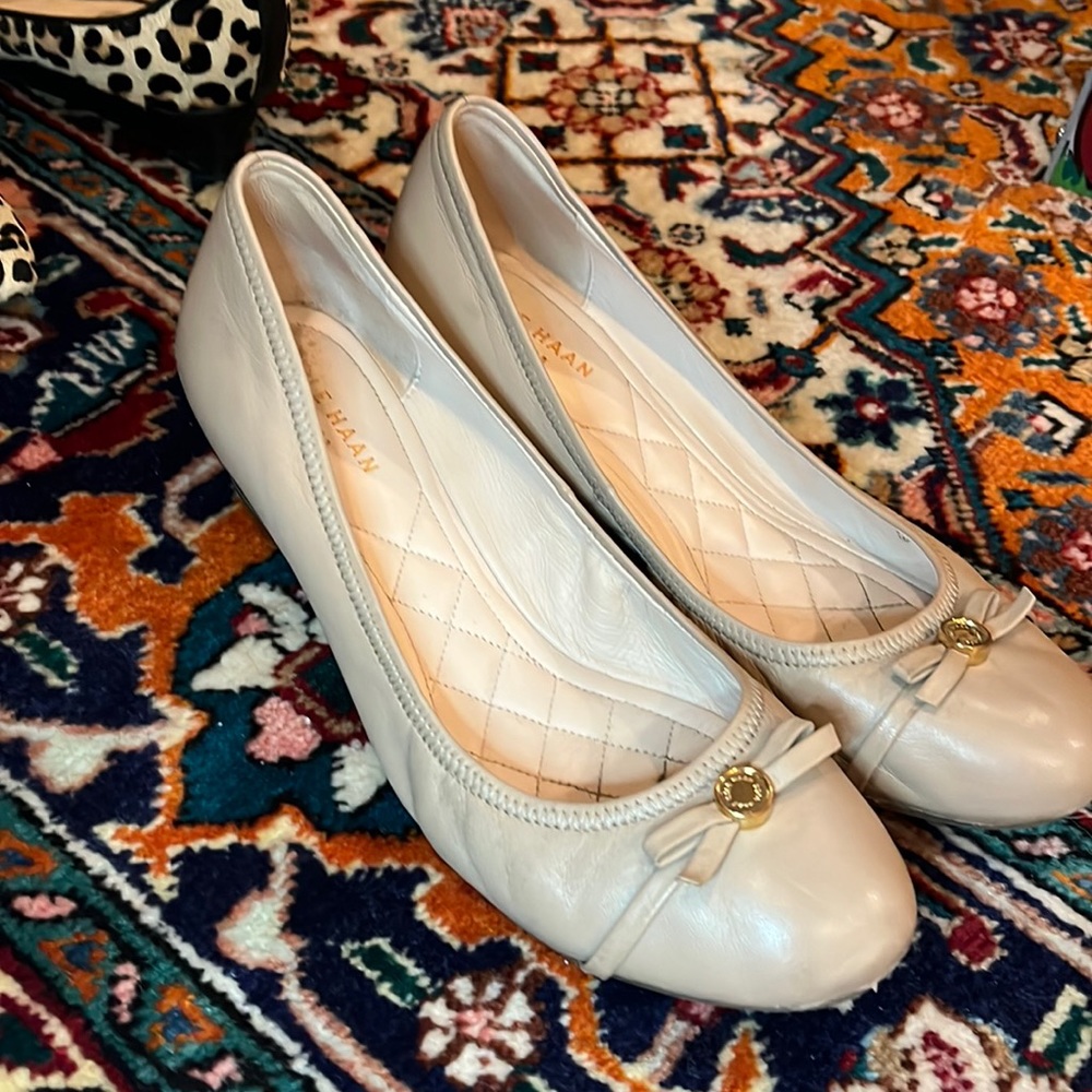 Beige Cole haan wedges.
